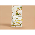 - 1701 Pistachio and Salted Caramel Honey Nougat pieces close‑up