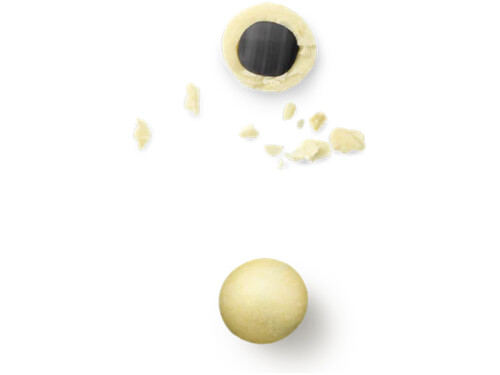 Passion fruit chocolate‑coated liquorice close‑up