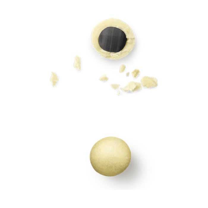 Passion fruit chocolate‑coated liquorice close‑up