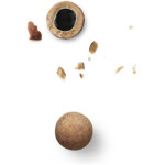 Salt and caramel chocolate‑coated liquorice close‑up